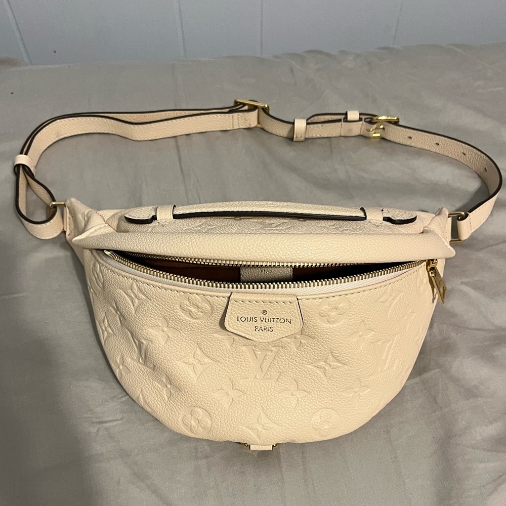 White LV bum bag. Used one time. Excellent condition